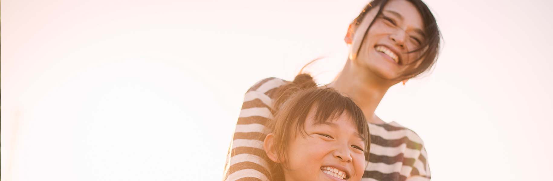 smiling man with son